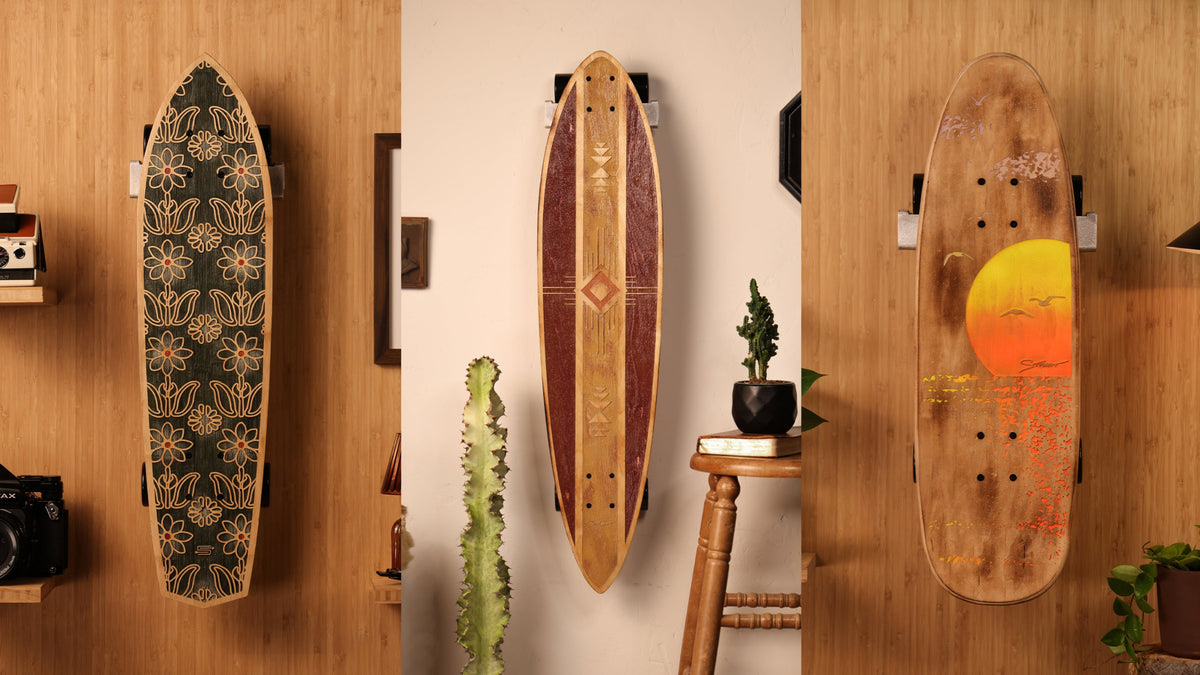 Strght longboard, street cruiser and retro skateboard displayed with wall hangers